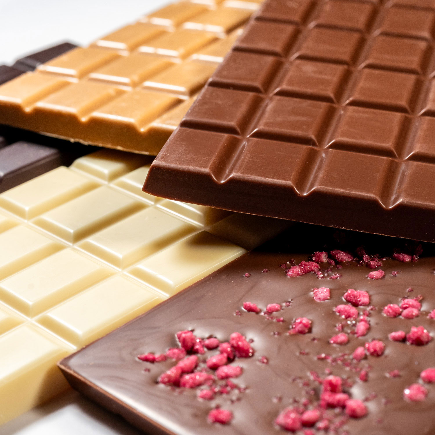 A stack of Baravelli's milk, white and dark slab bars